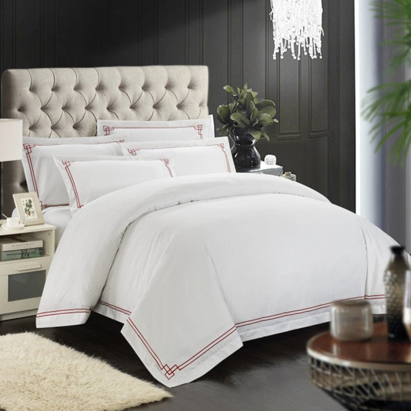 Taormina Bedding Sets: Luxury White Organic Cotton Duvet Cover Set with Vibrant Red Embroidery